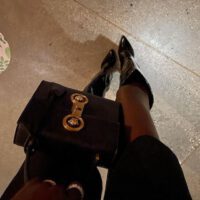 Adut akech legs in leather boots