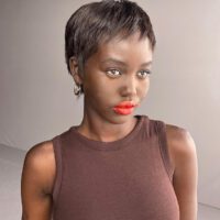 Adut akech redlipstick with short hair