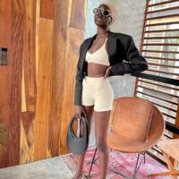 Adut akech wearing cream outfit