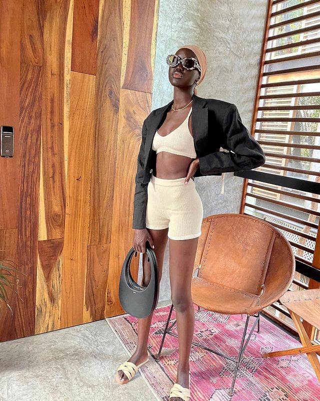 Adut akech wearing cream outfit