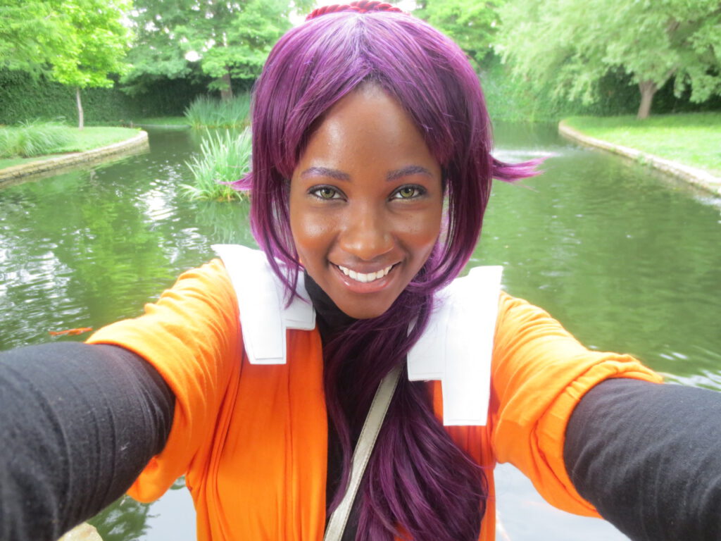 Beautiful face black girl cosplaying as yoruichi