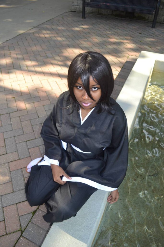 Black girl as rukia sitting down