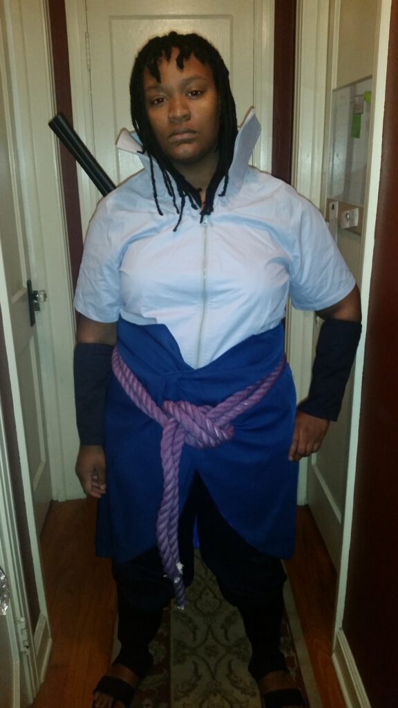 Black girl as sasuke with sword