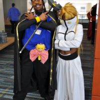 Black guy as don kanonji and black girl as tia harribel