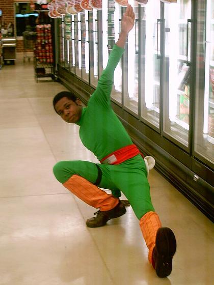 Black guy as rock lee in shop