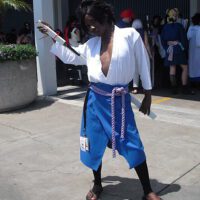 Black guy as sasuke with sword