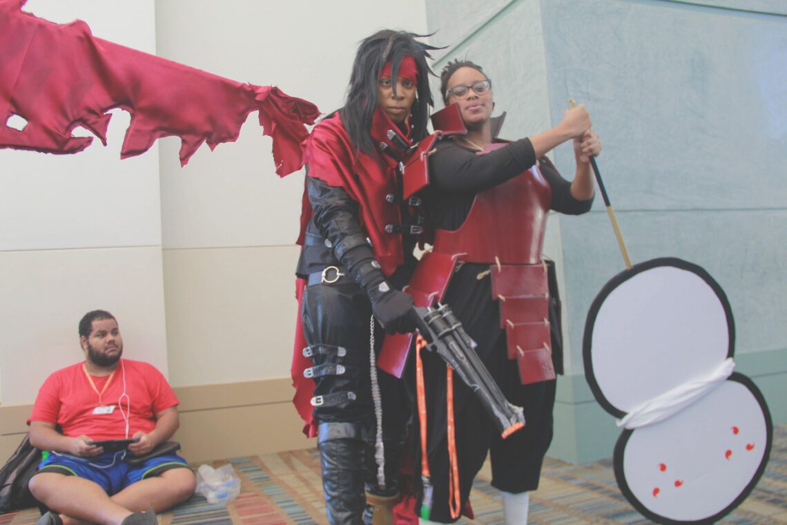 Black guy as vincent valentine and black girl as madara