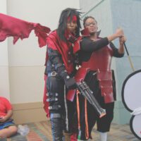 Black guy as vincent valentine and black girl as madara