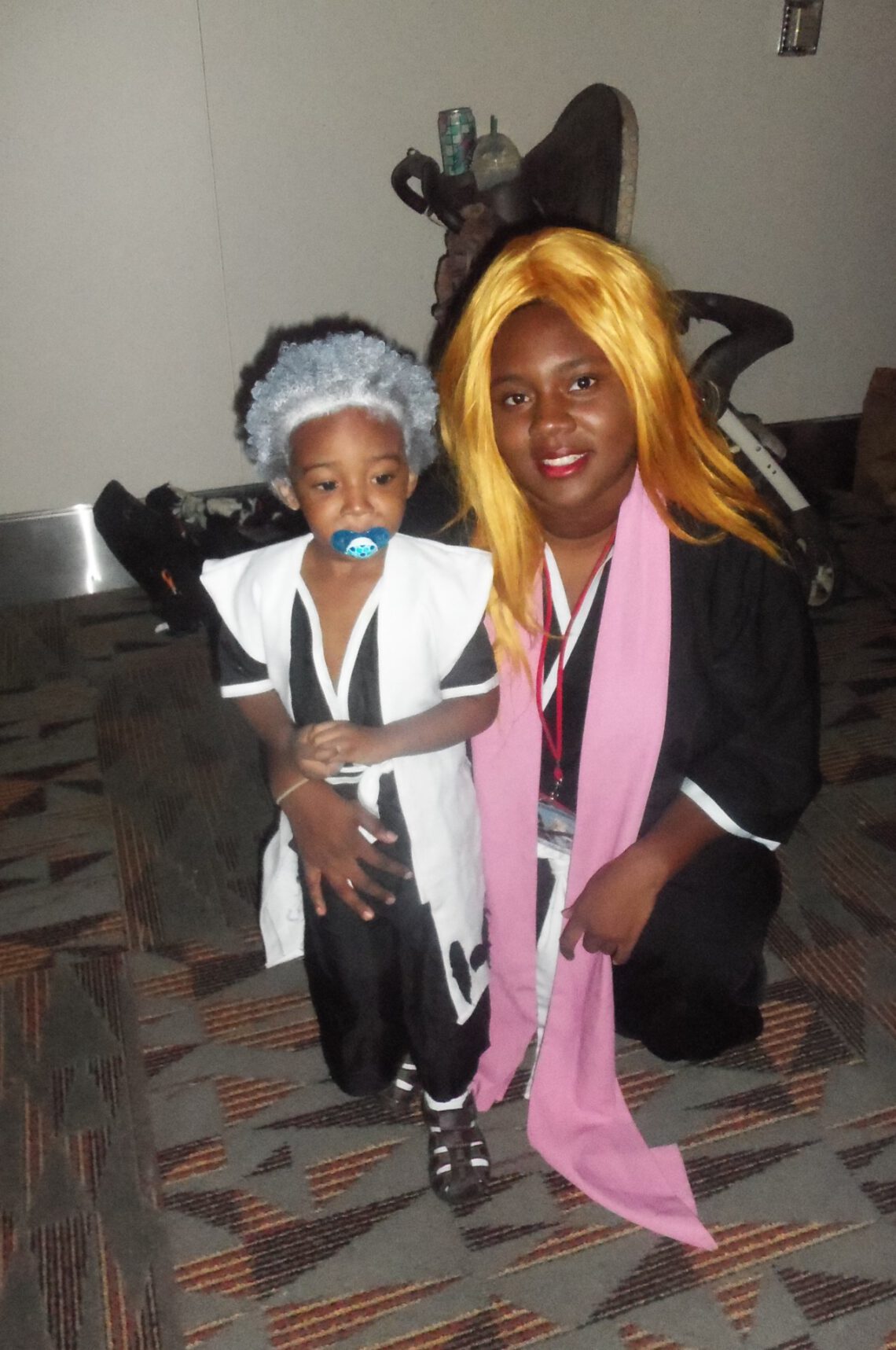 Cute black boy as hitsugaya with mom as rangiku