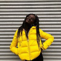 Duckie thot wearing yellow jacket