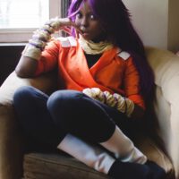 Perfect yoruichi cosplayer on couch