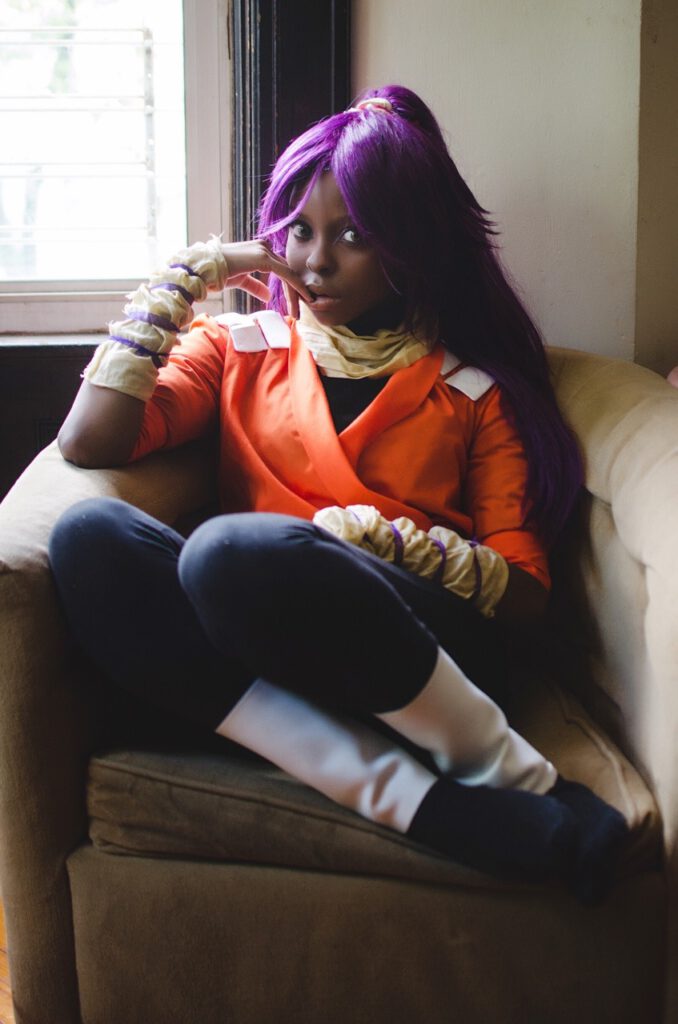 Perfect yoruichi cosplayer on couch