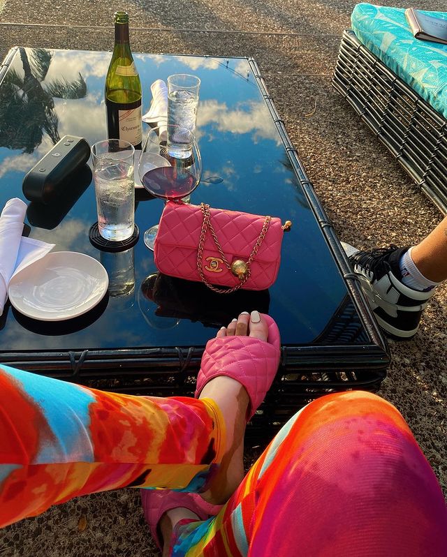 Winnie harlow feet with chanel purse and chanel slippers