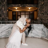 Kissing At Wedding