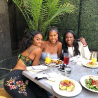 Christina Clemons eating lunch with friends