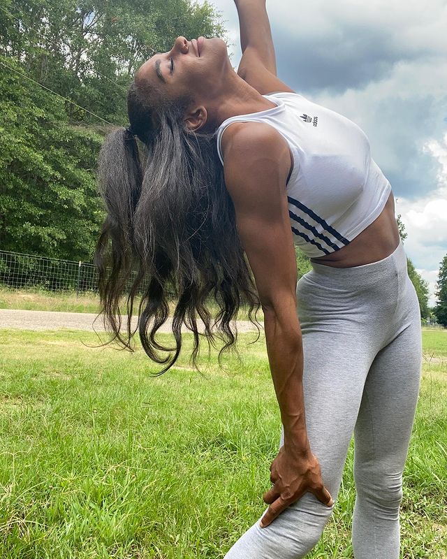 Christina Clemons wearing white adidas