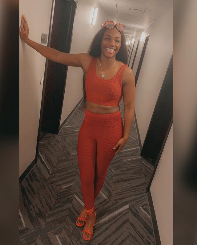 Claressa Shields reddish orange outfit