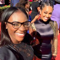 Claressa Shields smiling with glasses