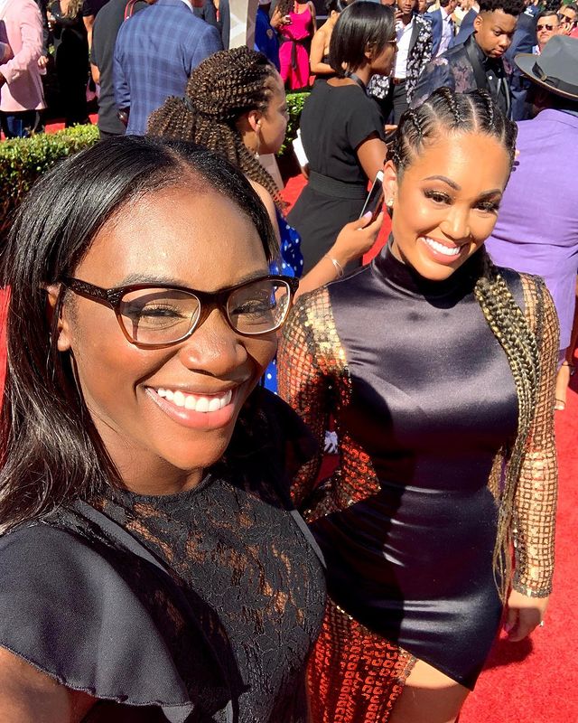 Claressa Shields smiling with glasses