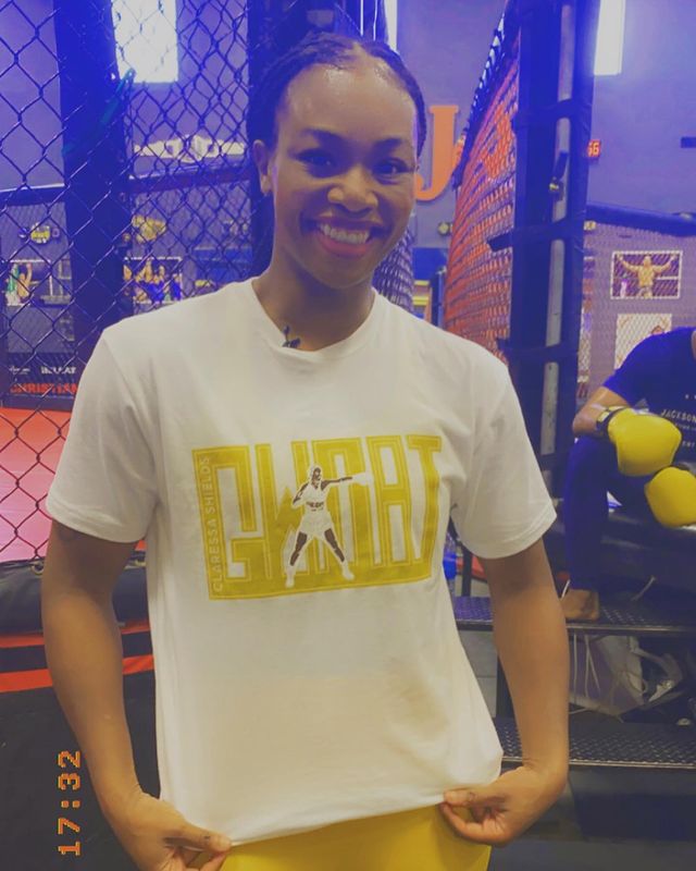 Claressa Shields smiling with shirt