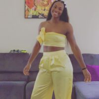 Claressa Shields wearing yellow outfit