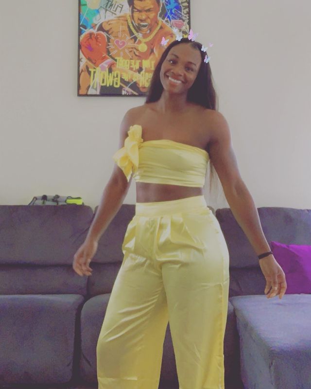 Claressa Shields wearing yellow outfit