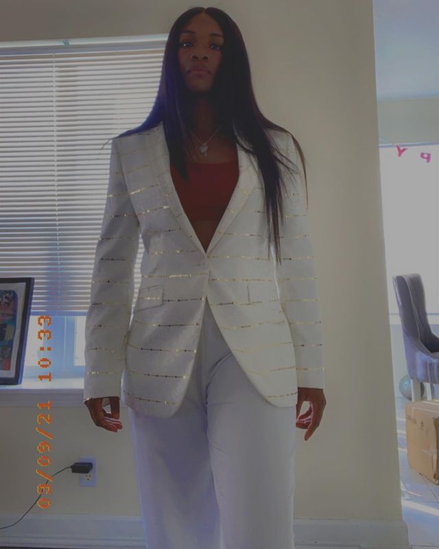 Claressa Shields white suit