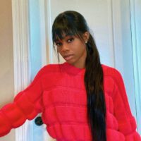 Gabby Douglas red sweater