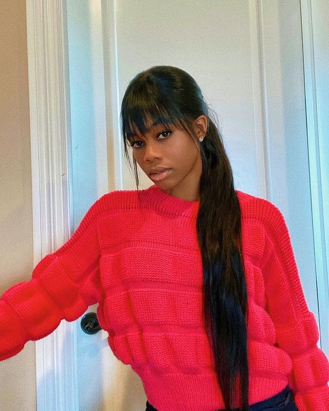 Gabby Douglas red sweater