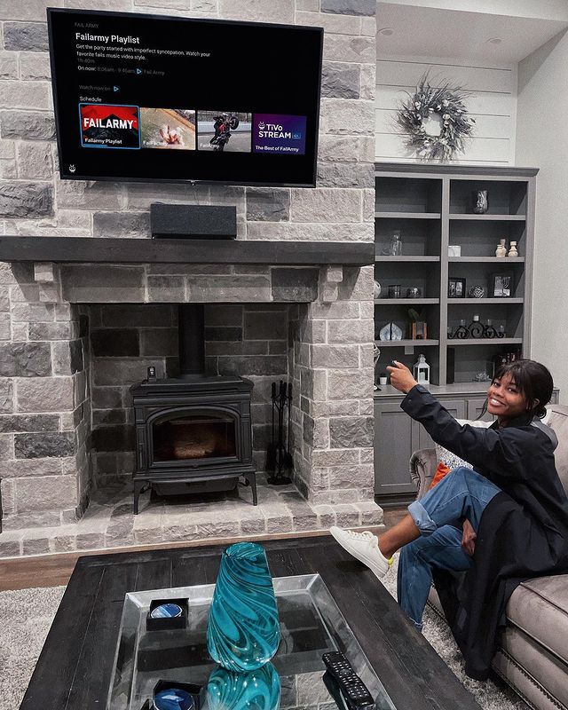 Gabby Douglas watching TV