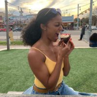 Gabby Thomas eating cupcake