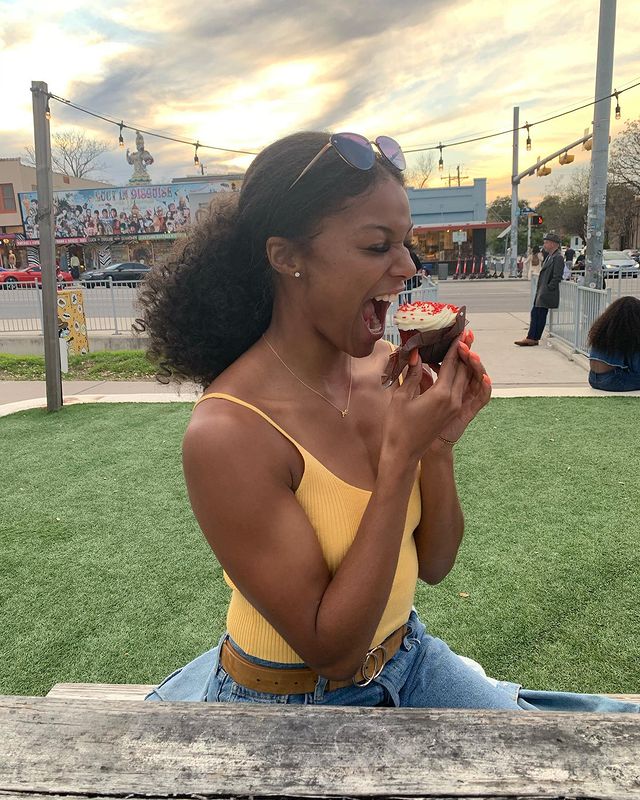 Gabby Thomas eating cupcake