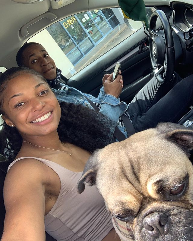 Gabby Thomas smile selfie with dog bf