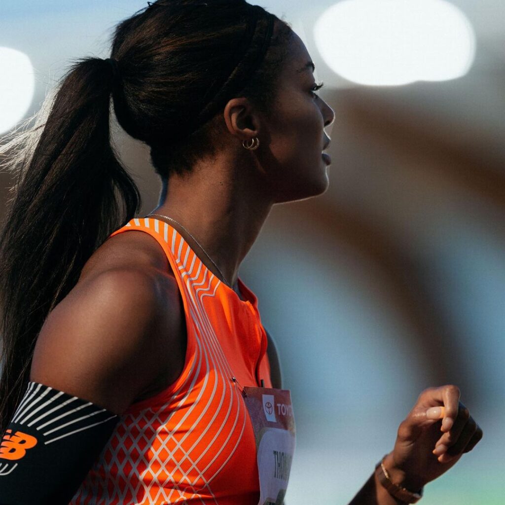 Gabby Thomas Wearing Orange