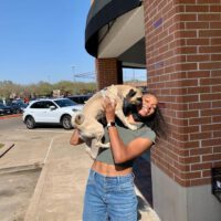 Gabby Thomas with dog