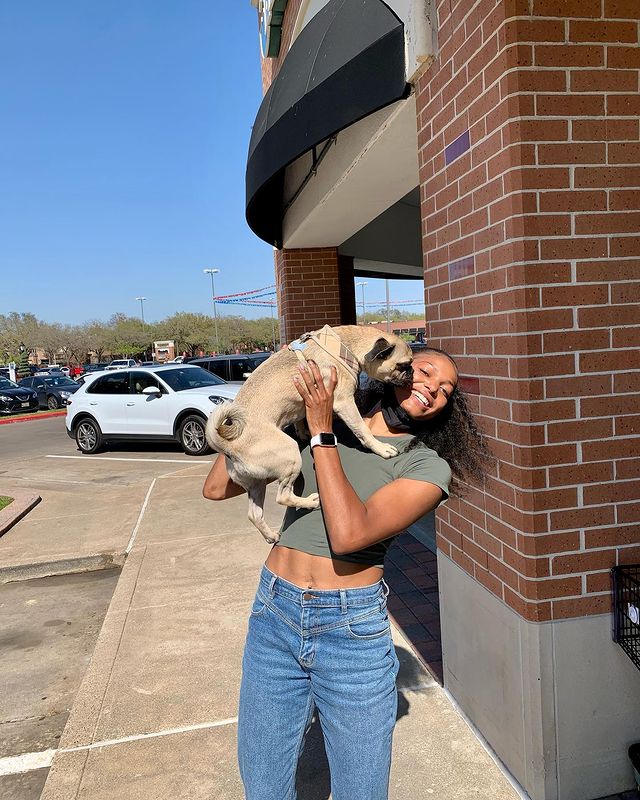 Gabby Thomas with dog