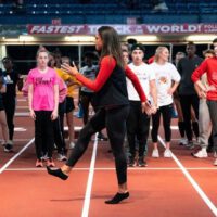 Sydney McLaughlin training kids