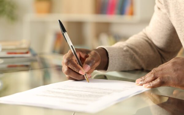 businessman filling out an online form