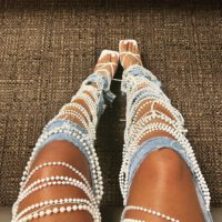 Aja Wilson Feet And Jewels On Jeans Outfit