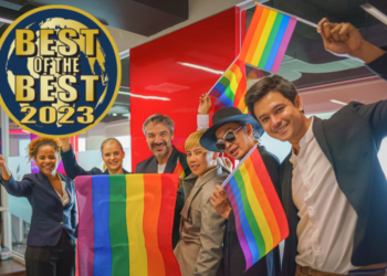 diverse group of business people (man, woman, gay, transgender, lesbian, asian, caucasian, african american, lgbtq) with rainbow flag on hand combine together as teamwork in office, selective focused