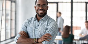 Portrait of happy African American small business owner