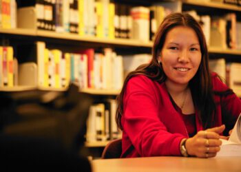 Native American college student In the library