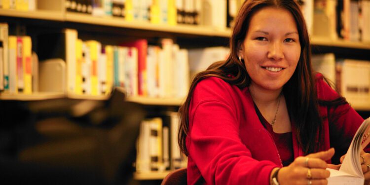 Native American college student In the library