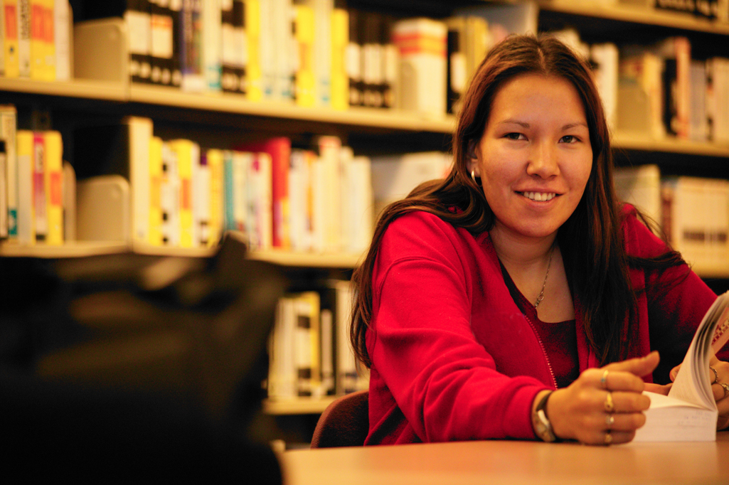 Native American college student In the library