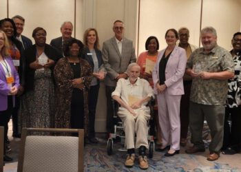 Participants at the NET Summit 2023 Awards pose together onstage