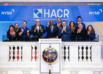 HACR staff and board members on the dais of the New York Stock Exchange on Friday, Oct. 6, 2023 during the closing ceremony.