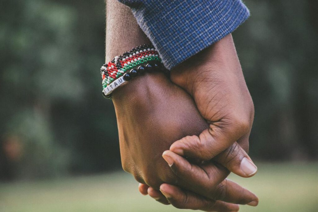 Black Couple Holding Hands