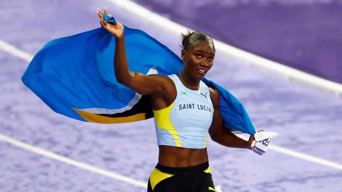 Julien Alfred Sprinting During 100m Race