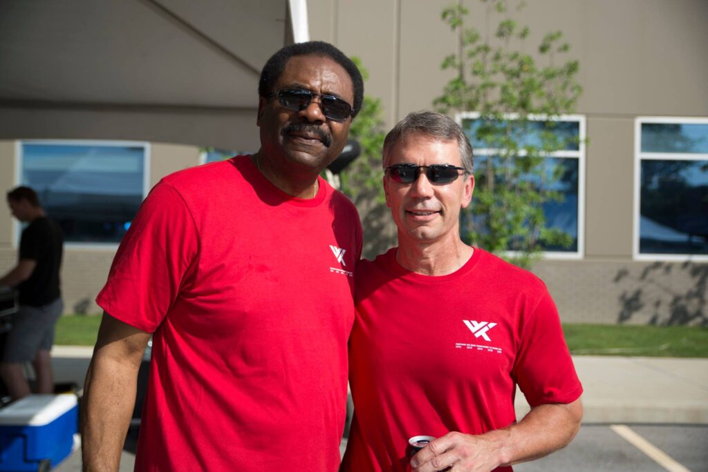 David Steward Wearing Red Shirt